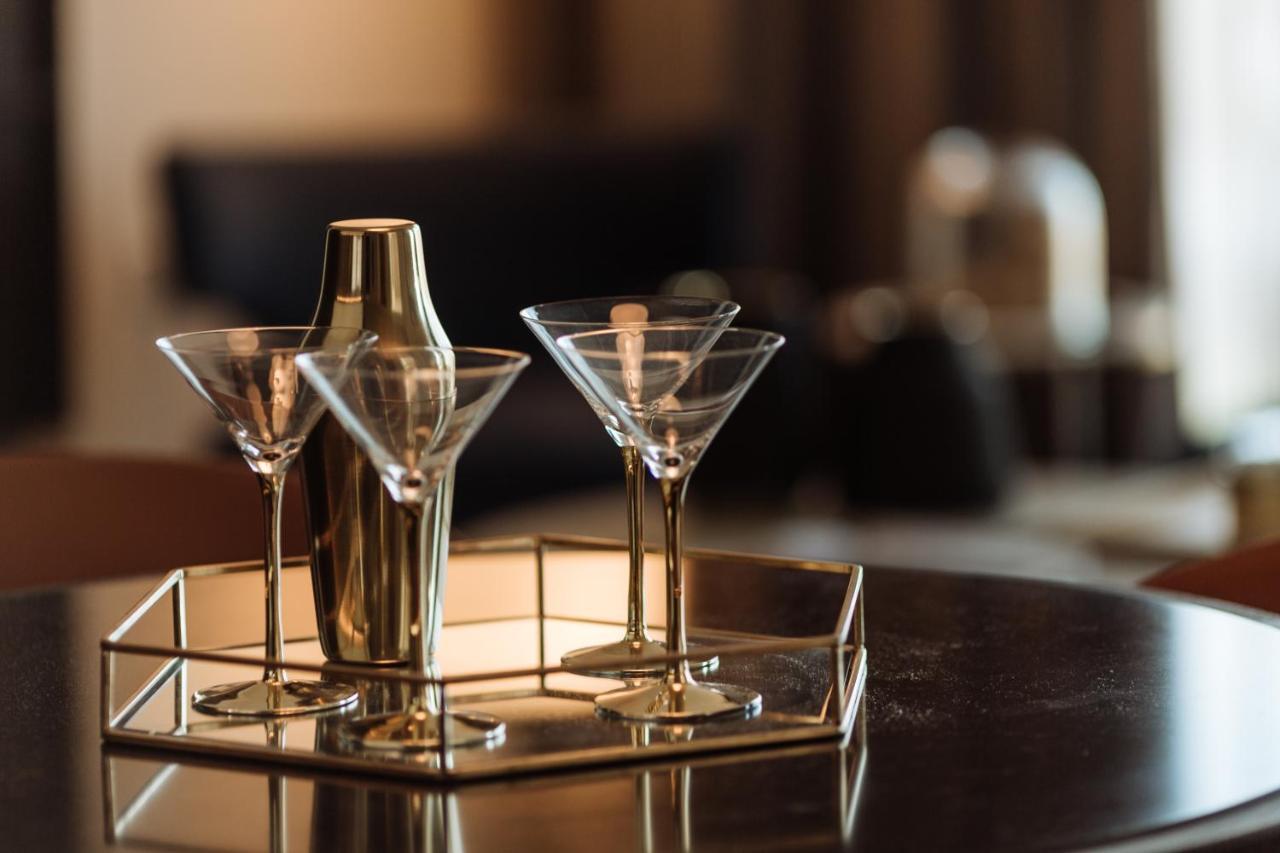 One Global Resorts Green Square Сидней Экстерьер фото A martini shaker and glasses