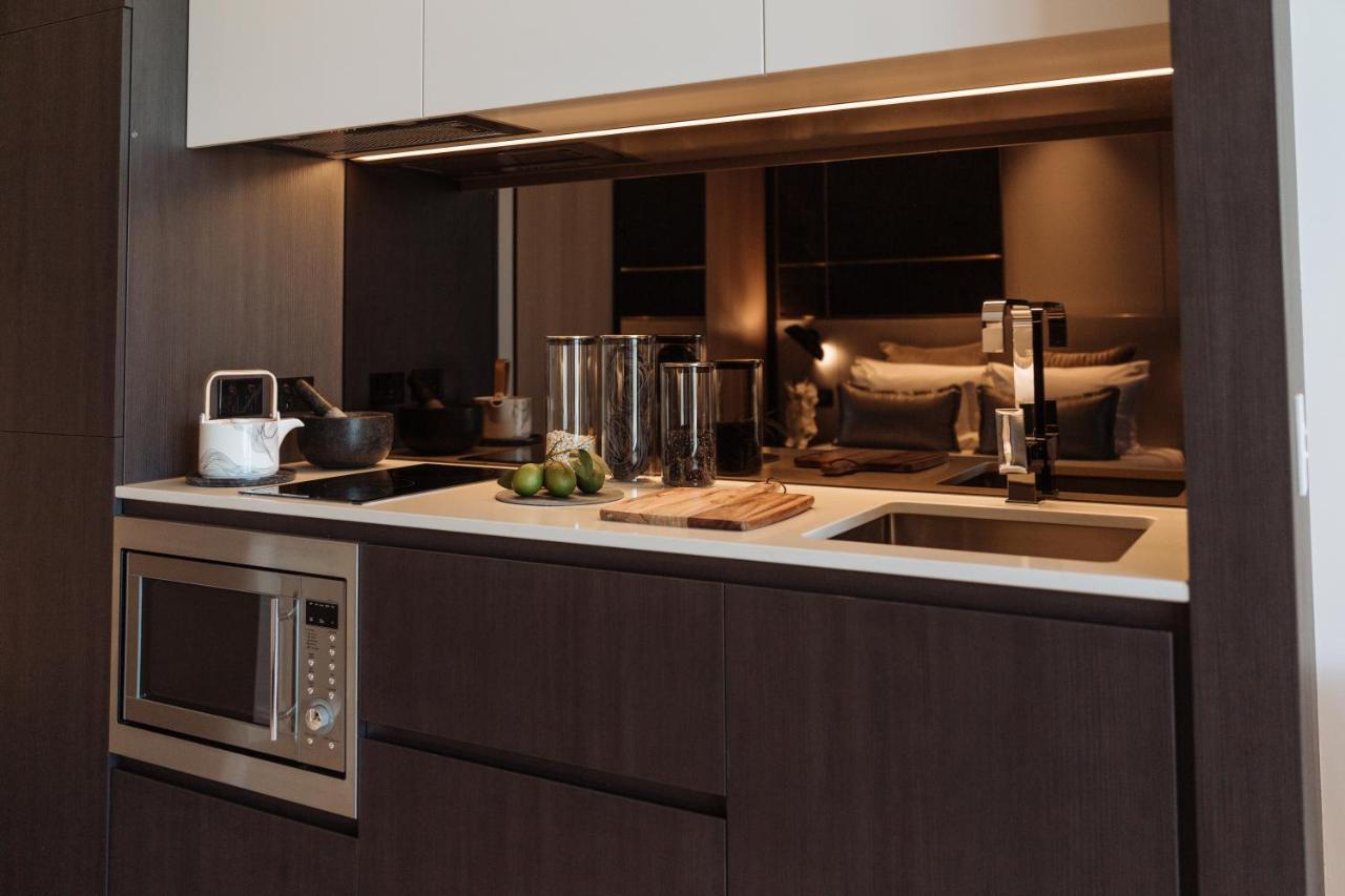 One Global Resorts Green Square Сидней Экстерьер фото A kitchen in a private home
