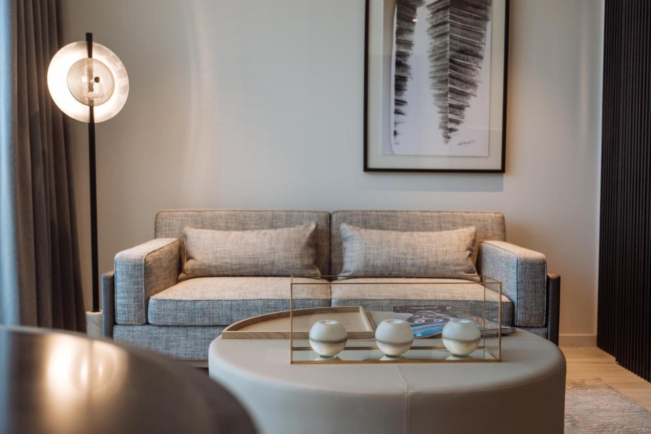 One Global Resorts Green Square Сидней Экстерьер фото A living room at the Ritz-Carlton, DIFC
