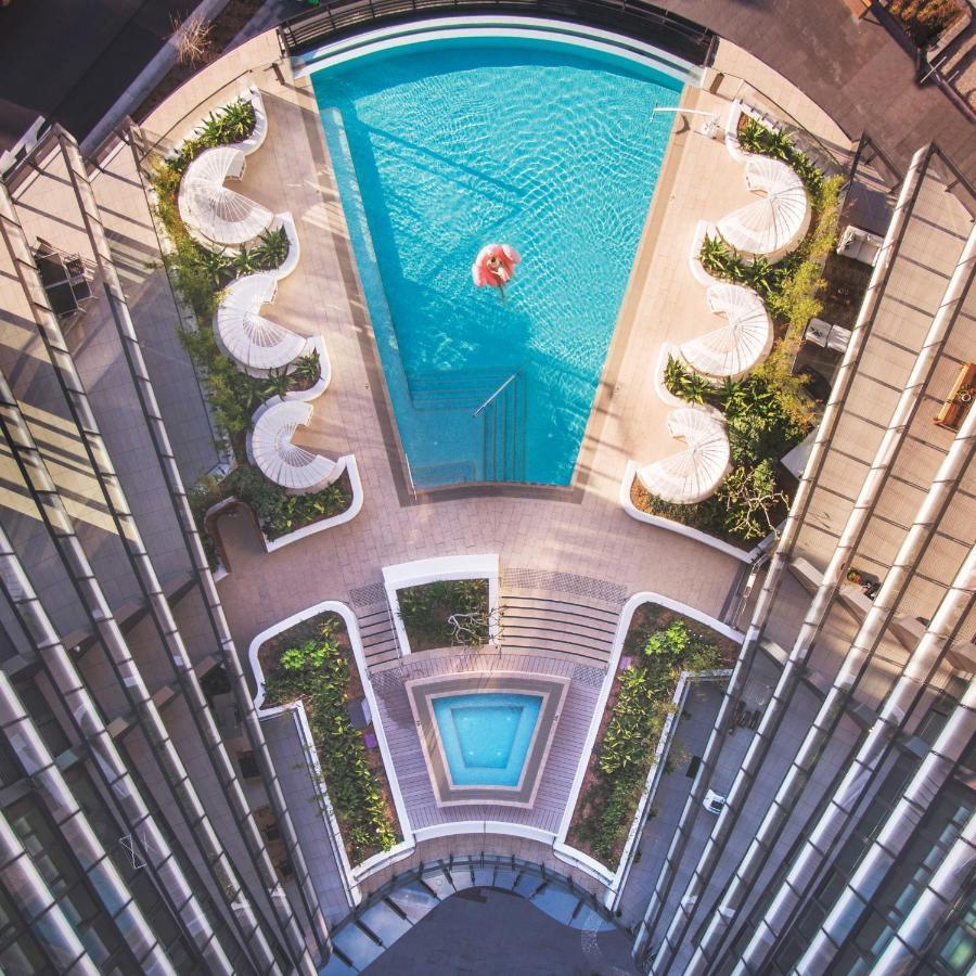 One Global Resorts Green Square Сидней Экстерьер фото The pool at the 1018